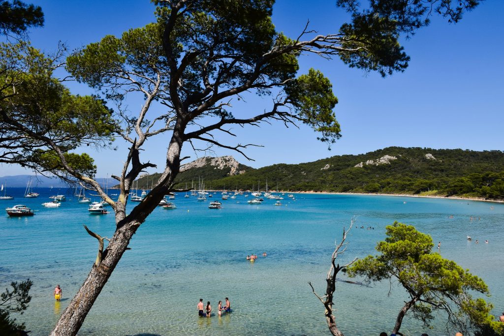 Beautiful beach scene with boats in Hyères, Provence-Alpes-Côte d'Azur, France.